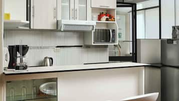 40-inch flat-screen TV with cable channels, TV, DVD player
