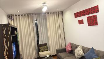 40-inch flat-screen TV with cable channels, TV, DVD player