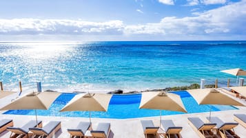 2 albercas al aire libre y camas balinesas (con cargo)