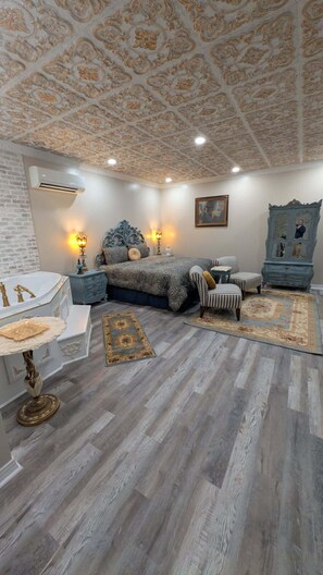 Deluxe Room, 1 King Bed | Pillowtop beds, individually decorated, individually furnished