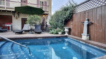 Outdoor pool, pool umbrellas, pool loungers