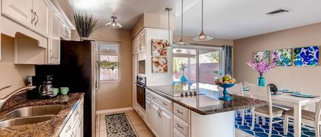 Apartment, 4 Bedrooms | Private kitchen | Fridge, microwave, coffee/tea maker