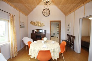 Suite, 3 Bedrooms | In-room dining - Lakefront Cottage in Manitou Beach (Manitou Beach)
