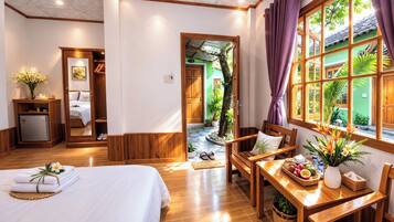 Family Quadruple Room, Garden View | Egyptian cotton sheets, minibar, in-room safe, desk