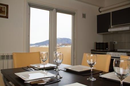 Family Apartment, 1 Bedroom, Sea View | Private kitchen | Full-size fridge, microwave, oven, stovetop