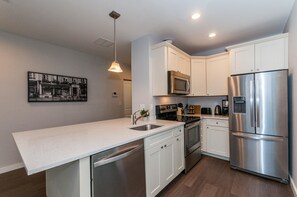 Apartment, 2 Bedrooms | Private kitchen | Fridge, microwave, coffee/tea maker