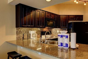 Condo, 2 Bedrooms | Private kitchen | Fridge, microwave, oven, stovetop - Riverfront Bliss (New Braunfels)