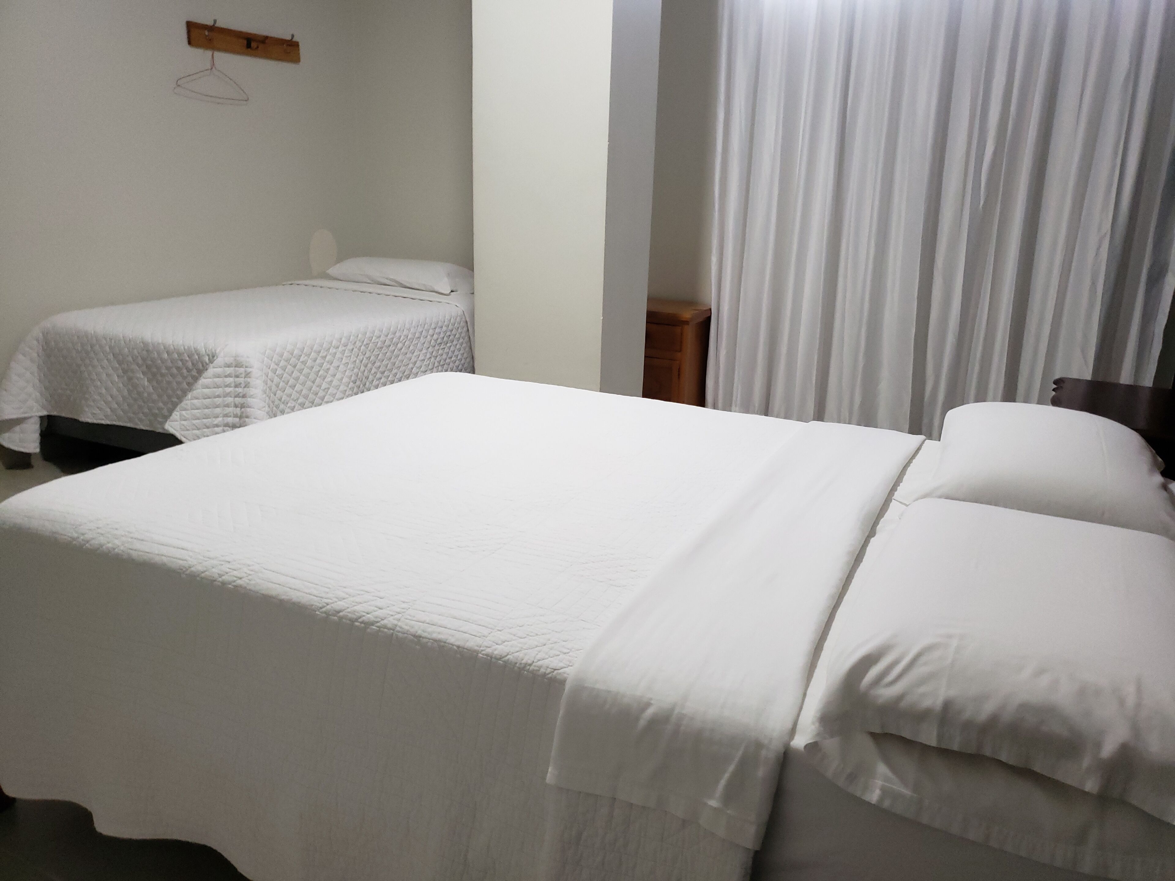 Triple Room | Desk, blackout drapes, free WiFi