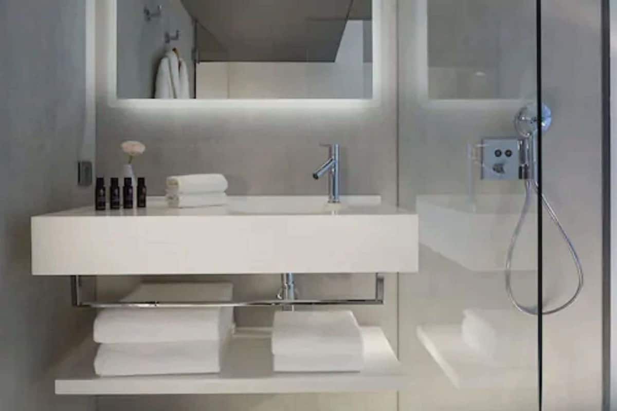 Bathroom | Rainfall showerhead, free toiletries, hair dryer, slippers