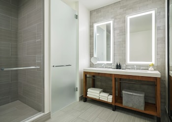 Suite (Aspen) | Bathroom | Designer toiletries, hair dryer, bathrobes, slippers at Limelight Hotel Denver