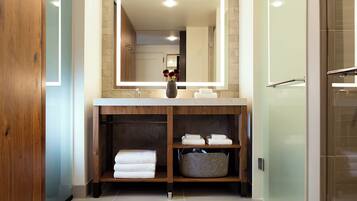 Designer toiletries, hair dryer, bathrobes, slippers