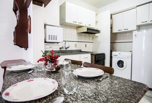 Apartment, 1 Bedroom | Private kitchen | Fridge, microwave, coffee/tea maker