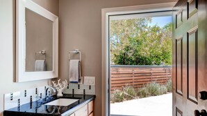 A bathroom with a sink, mirror, and towel rack. - PX037 3 Bedroom Apartment By Senstay (Phoenix)