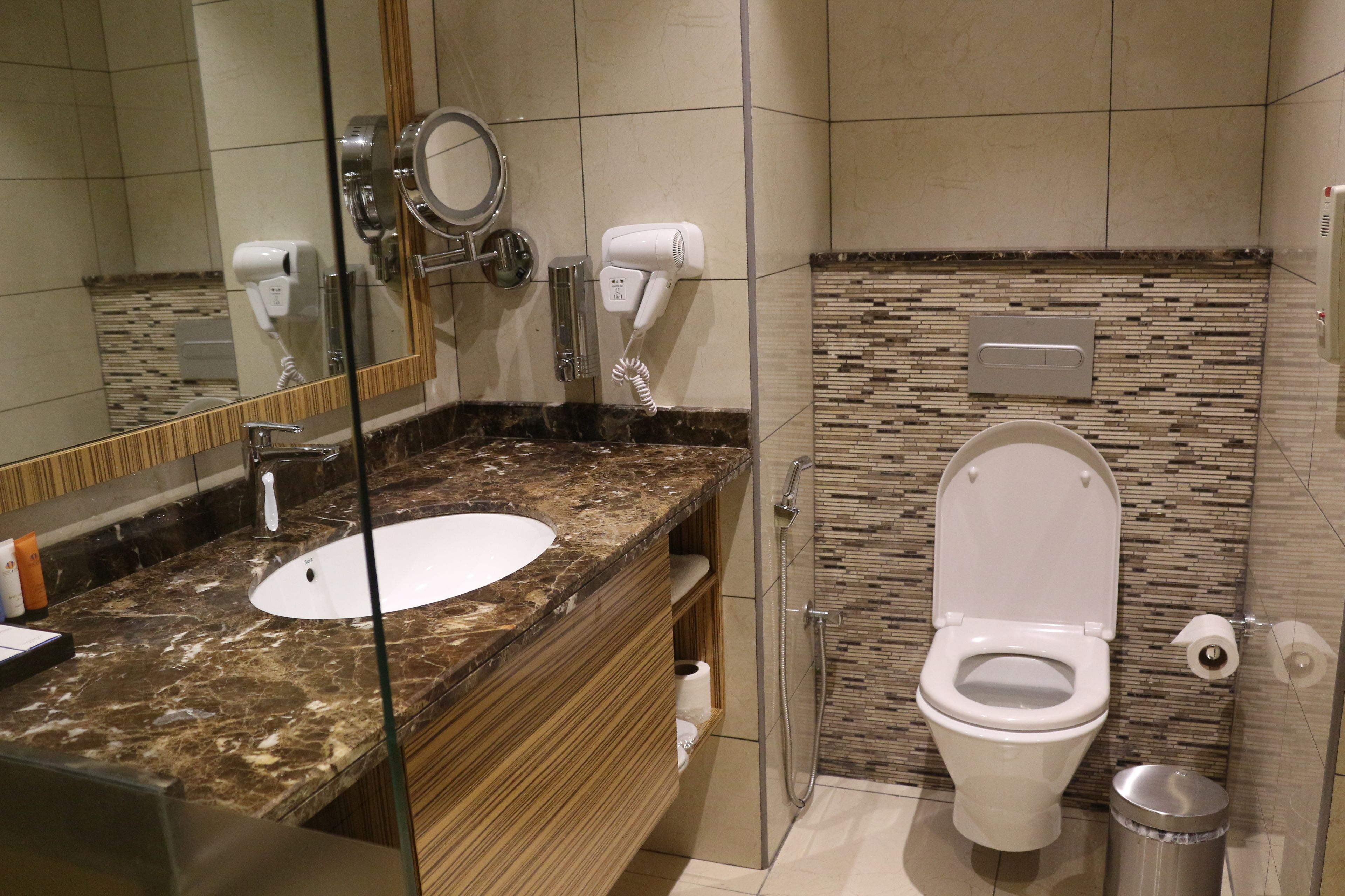 family room, multiple beds, non smoking (1 king and 2 single beds) | bathroom | rainfall showerhead, free toiletries, slippers, bidet