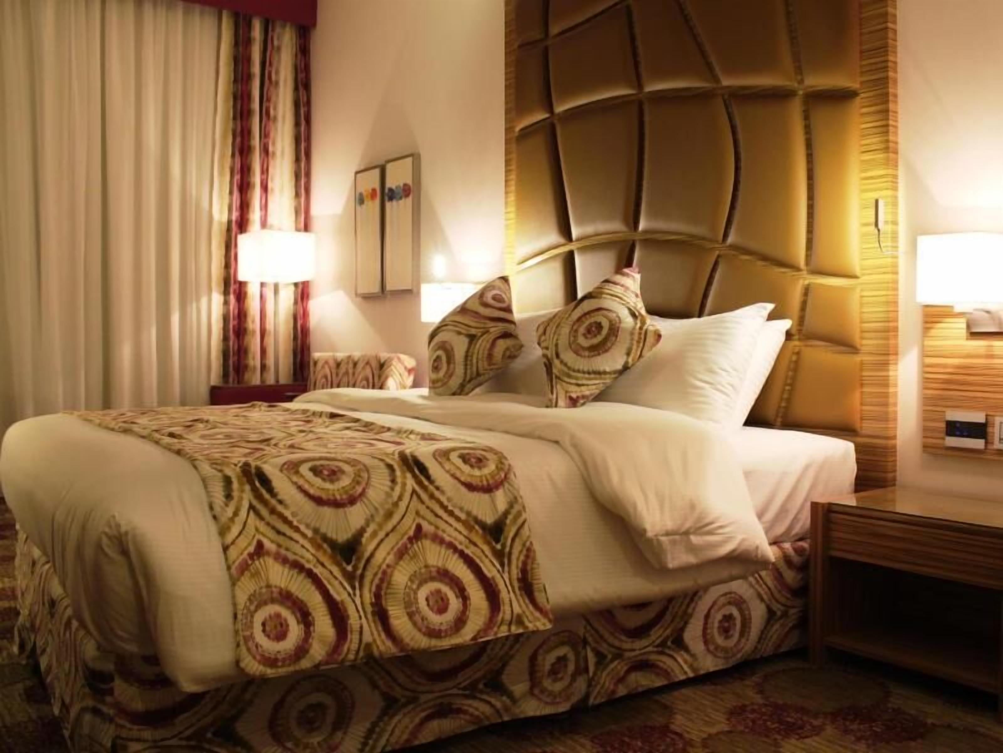 Egyptian cotton sheets, premium bedding, down duvets, minibar