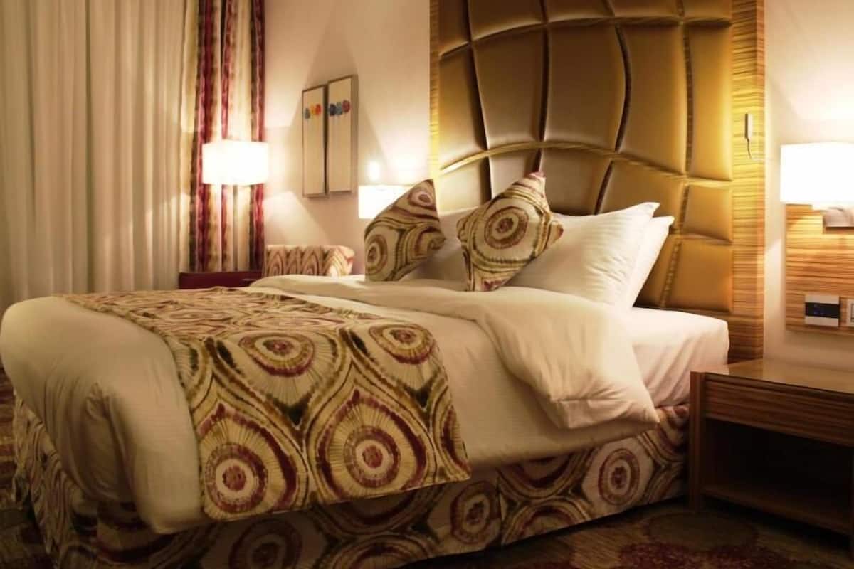 Egyptian cotton sheets, premium bedding, down duvets, minibar