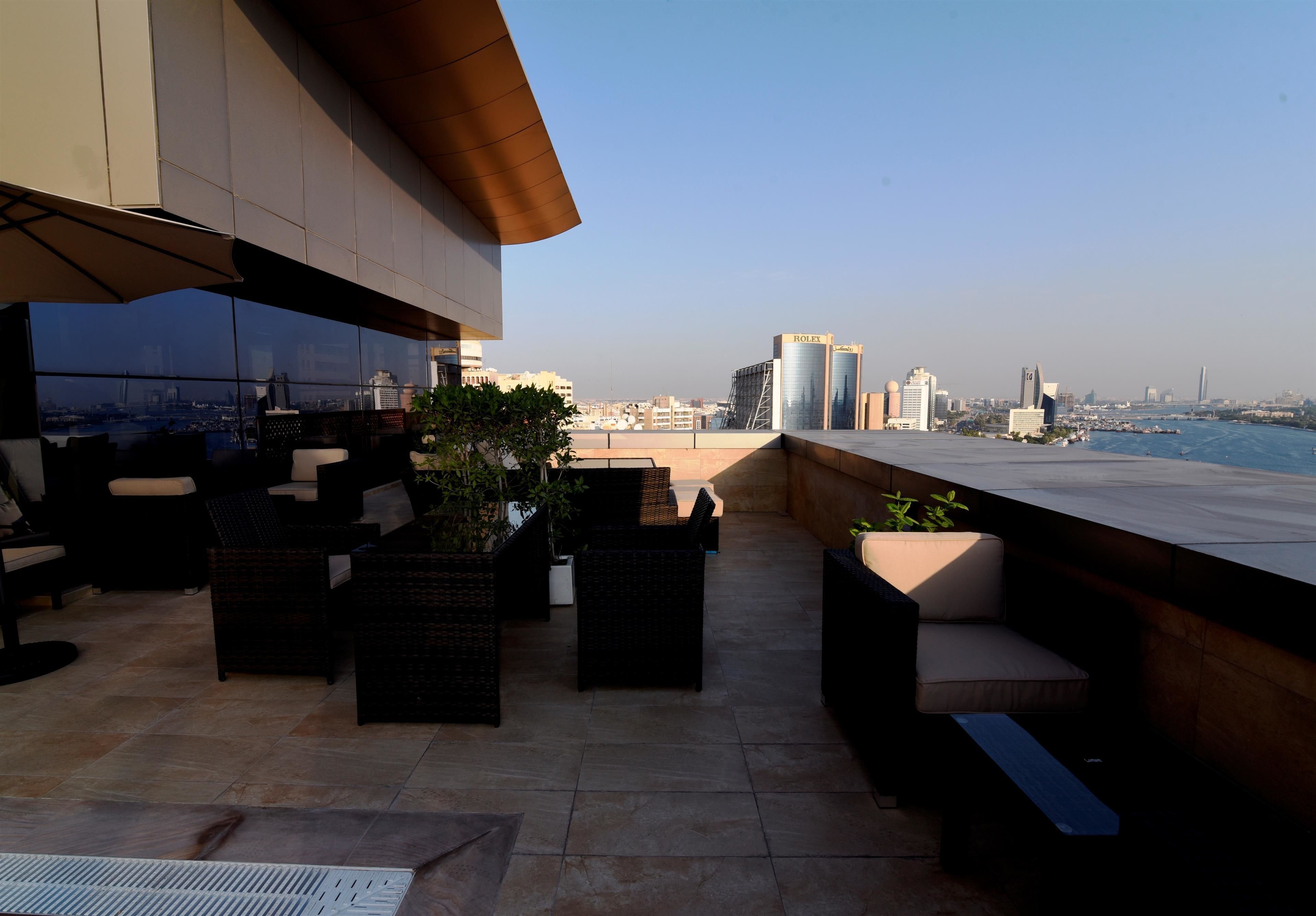 outdoor pool, open 7:00 am to 6:30 pm, pool umbrellas, pool loungers