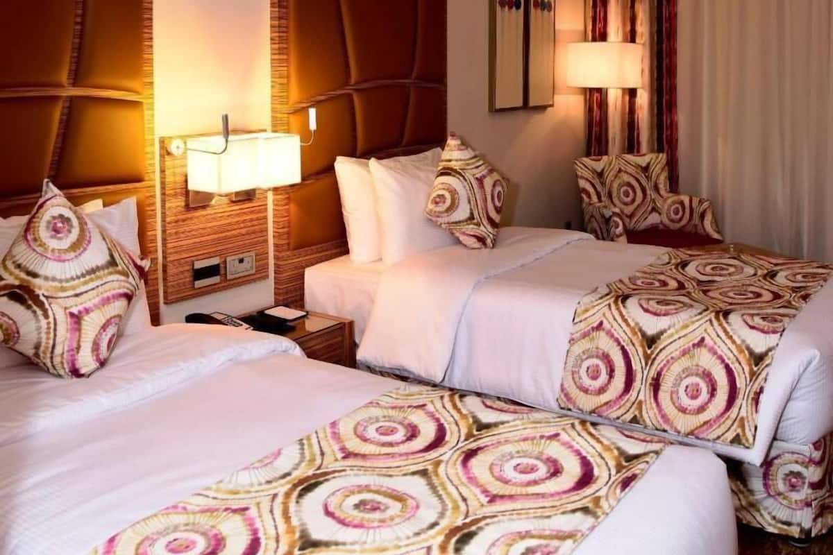 Egyptian cotton sheets, premium bedding, down duvets, minibar