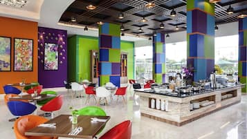 Breakfast, lunch, dinner served; international cuisine, pool views