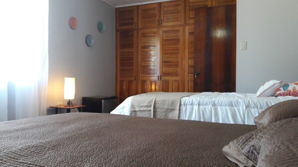 Standard Room, 1 Bedroom, Shared Bathroom | Pillow-top beds, in-room safe, individually decorated