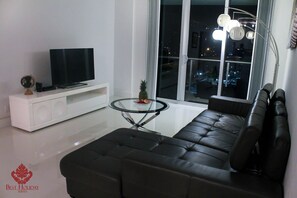 Appartamento familiare, 1 camera da letto, vista piscina, lato spiaggia | Area soggiorno