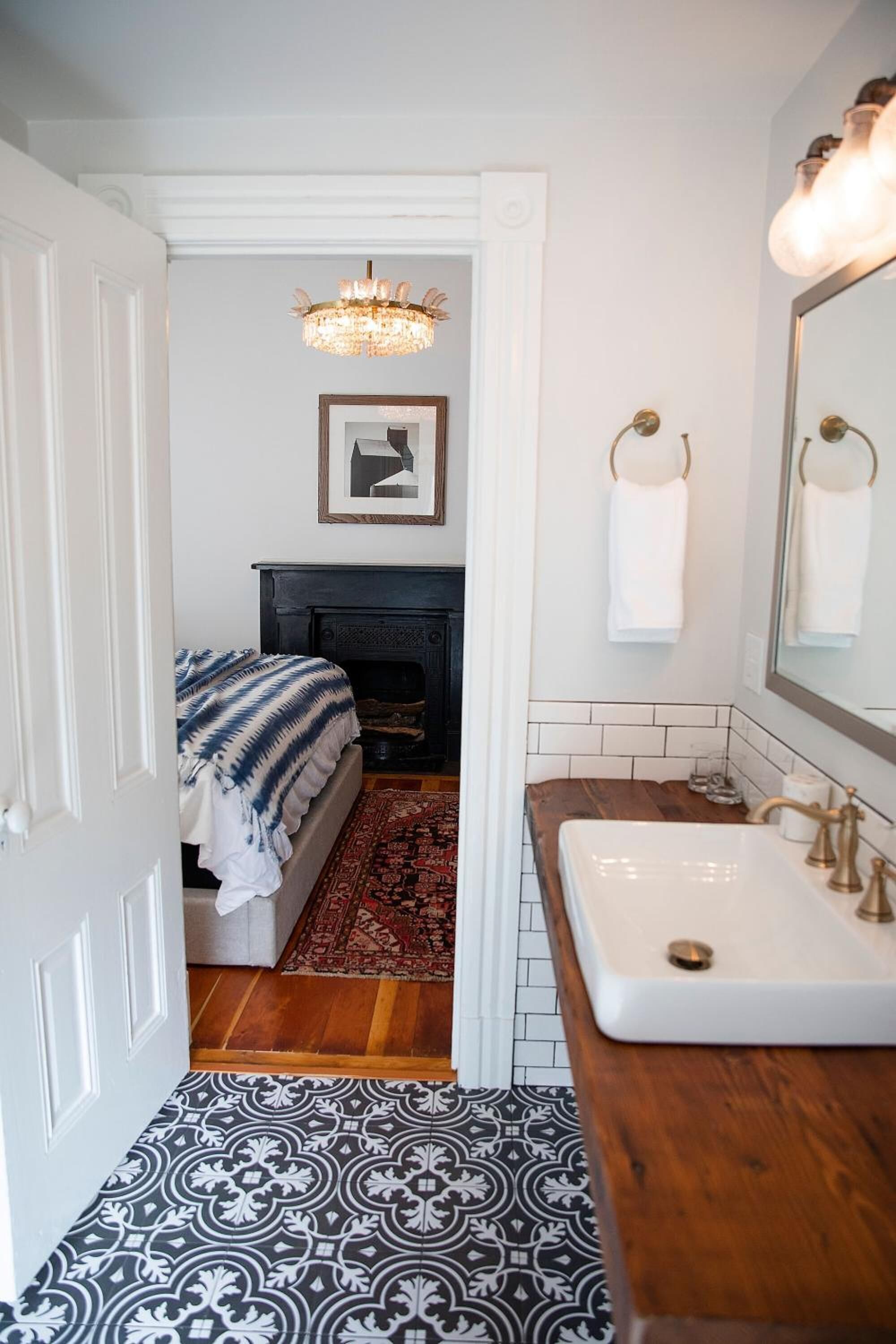 king suite | bathroom | designer toiletries, hair dryer, towels