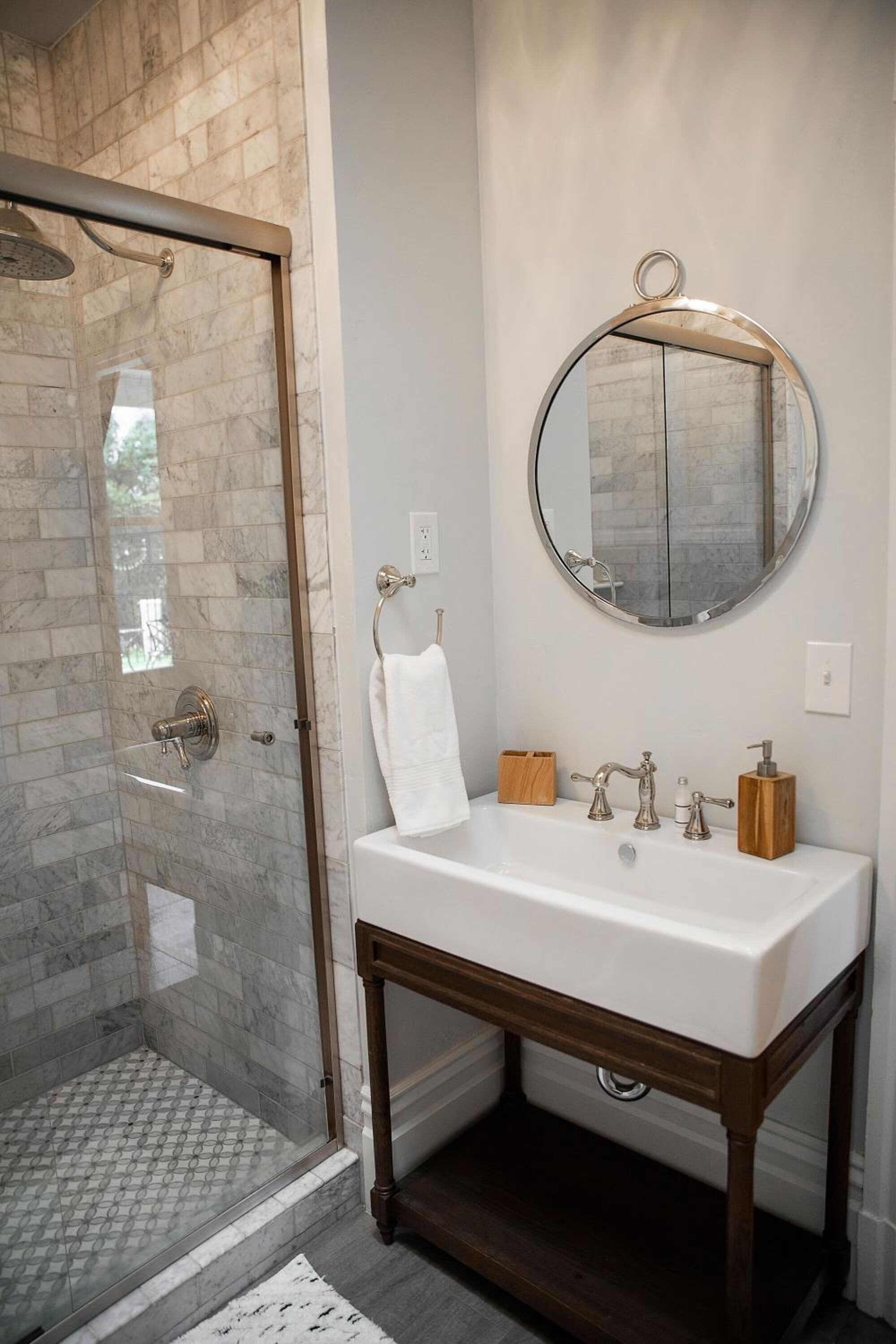 designer toiletries, hair dryer, towels