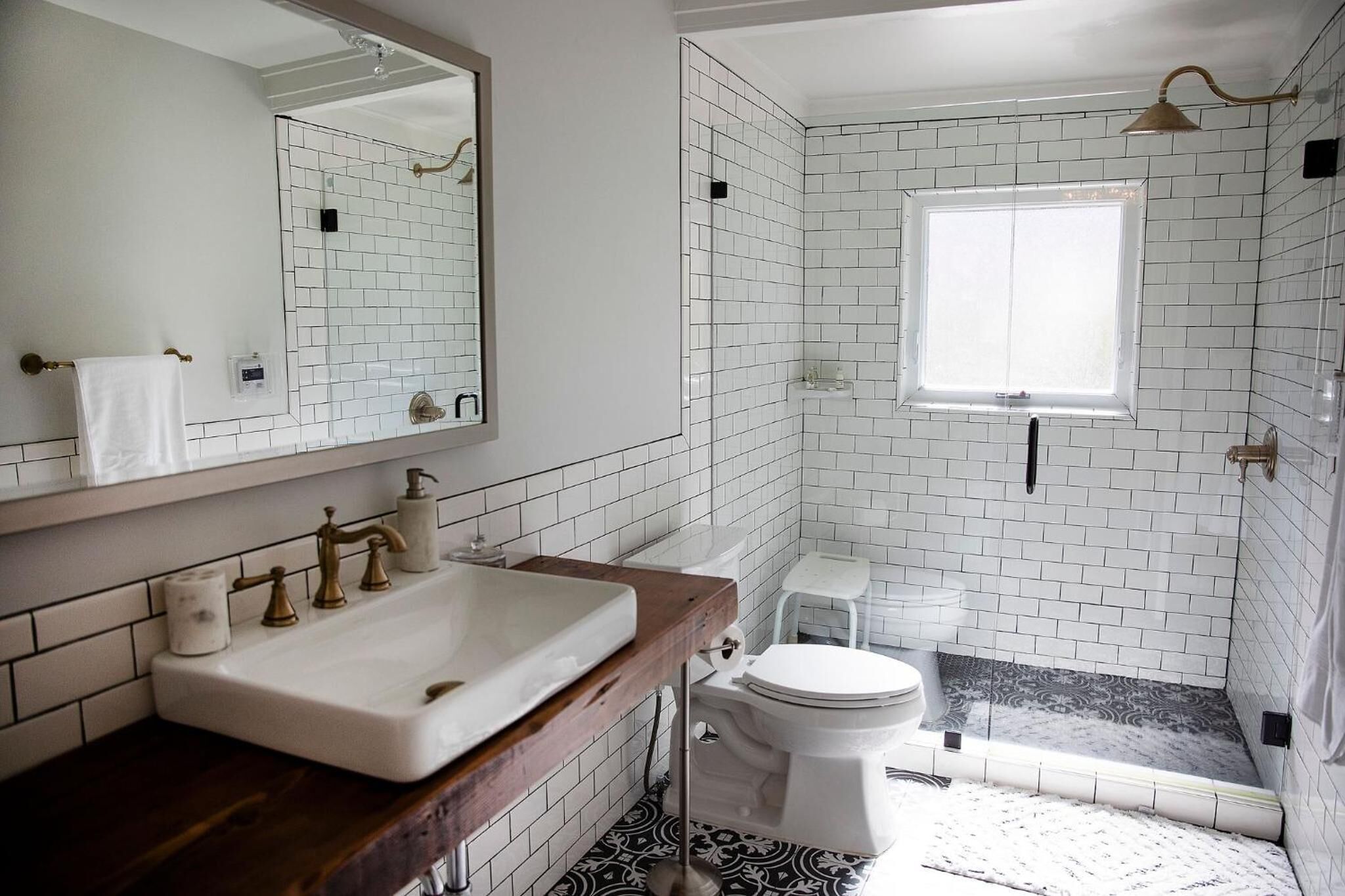 designer toiletries, hair dryer, towels