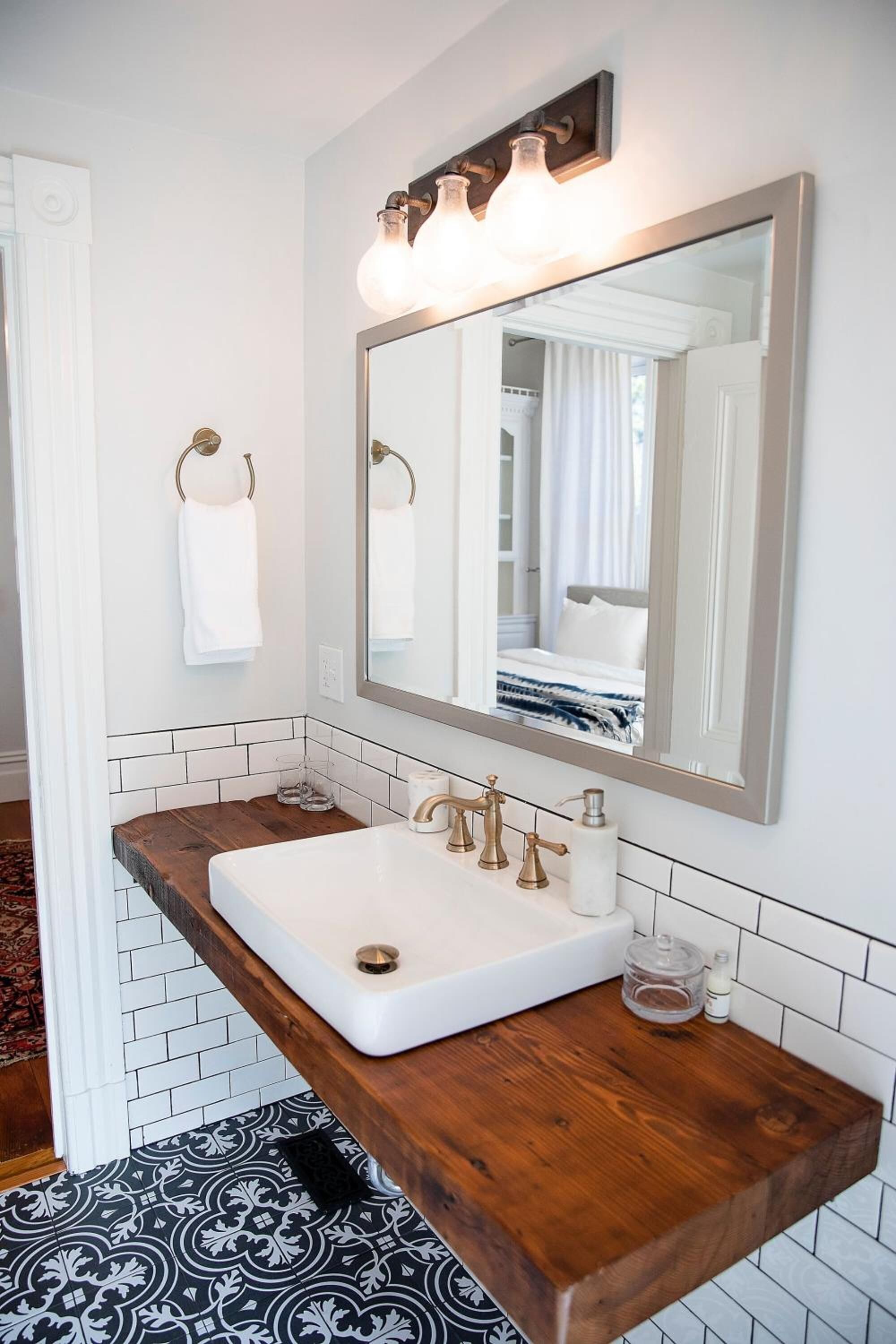 designer toiletries, hair dryer, towels