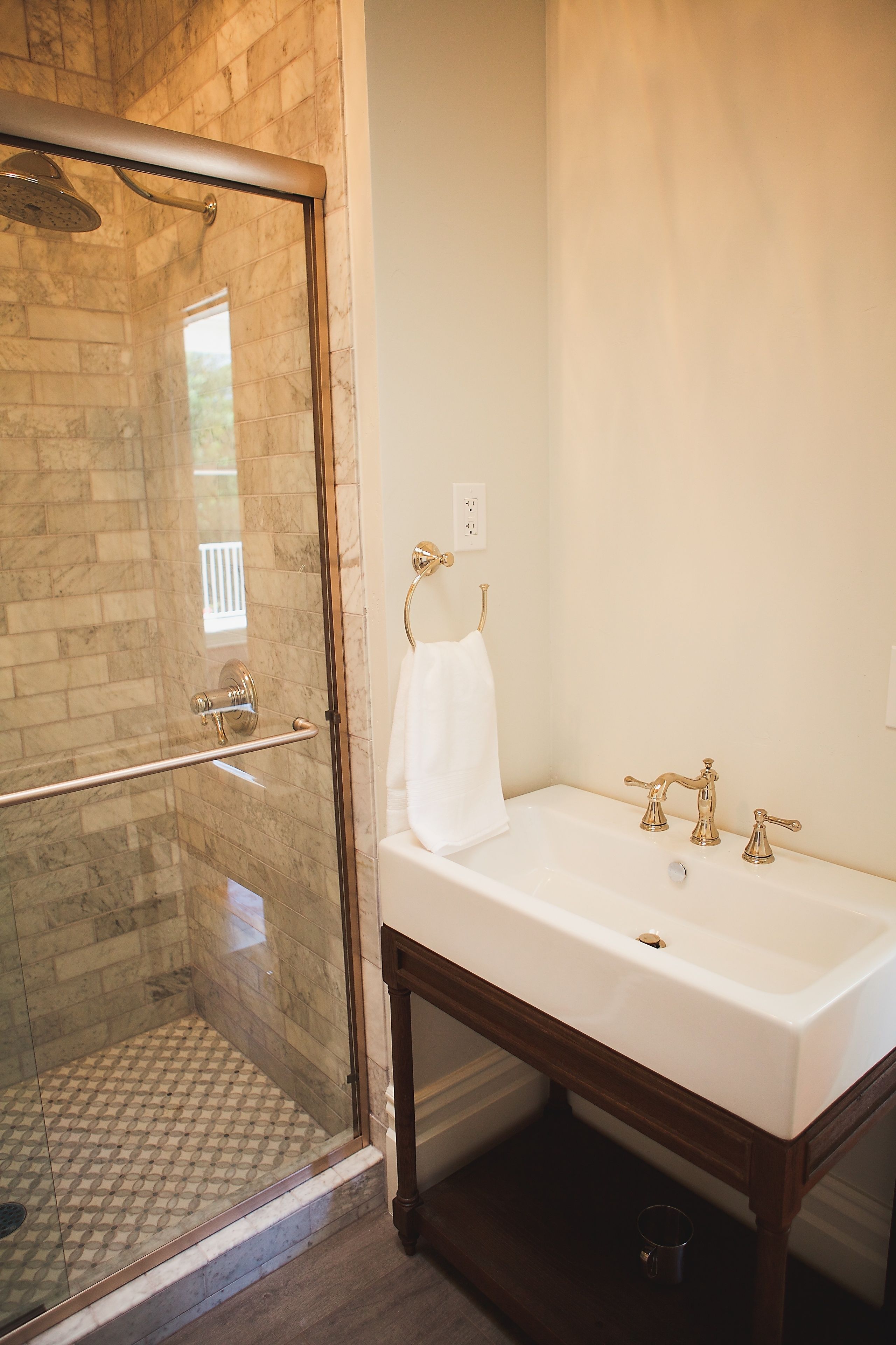 designer toiletries, hair dryer, towels