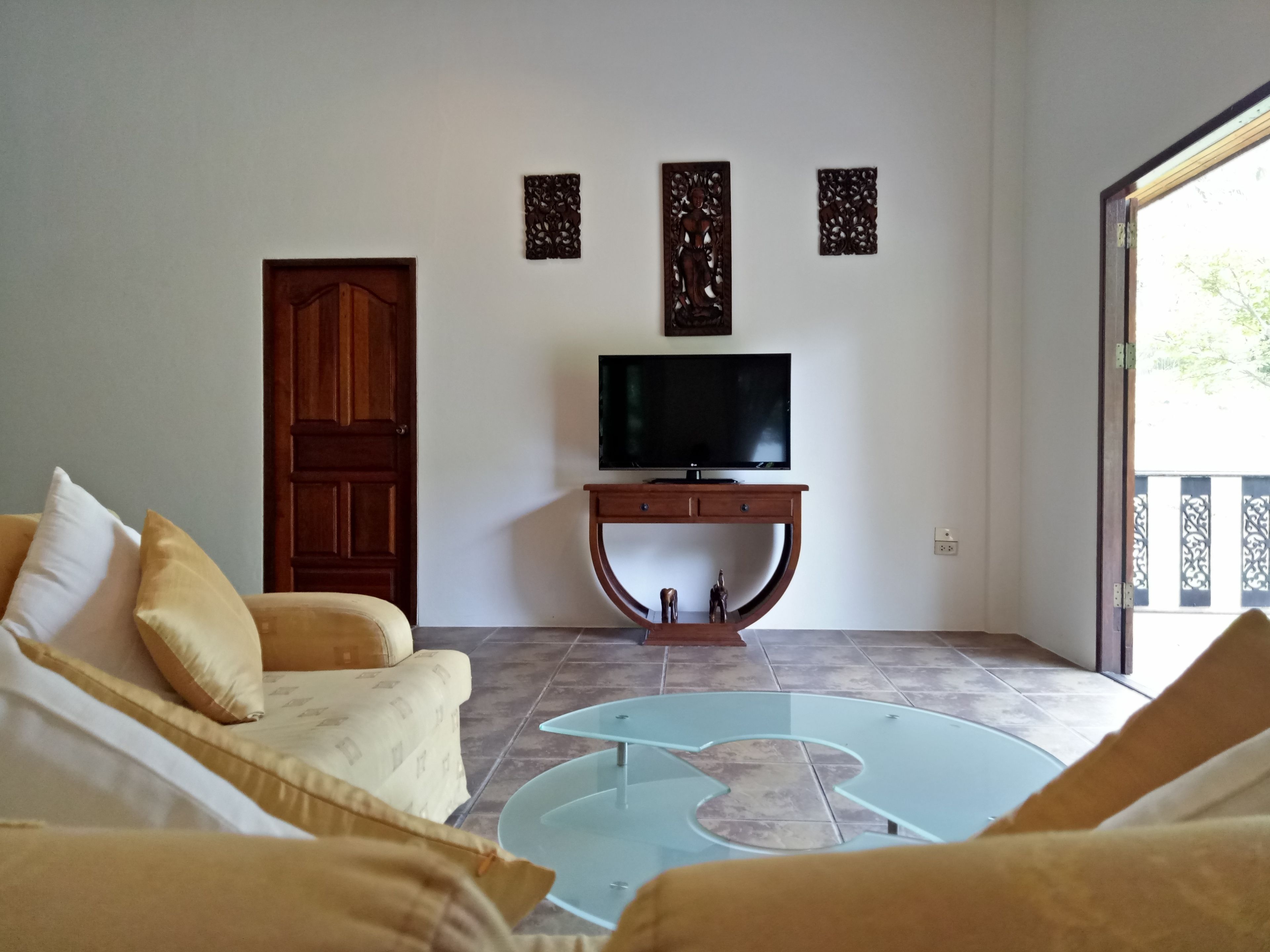 family villa with pool view | living area | 32-inch led tv with digital channels