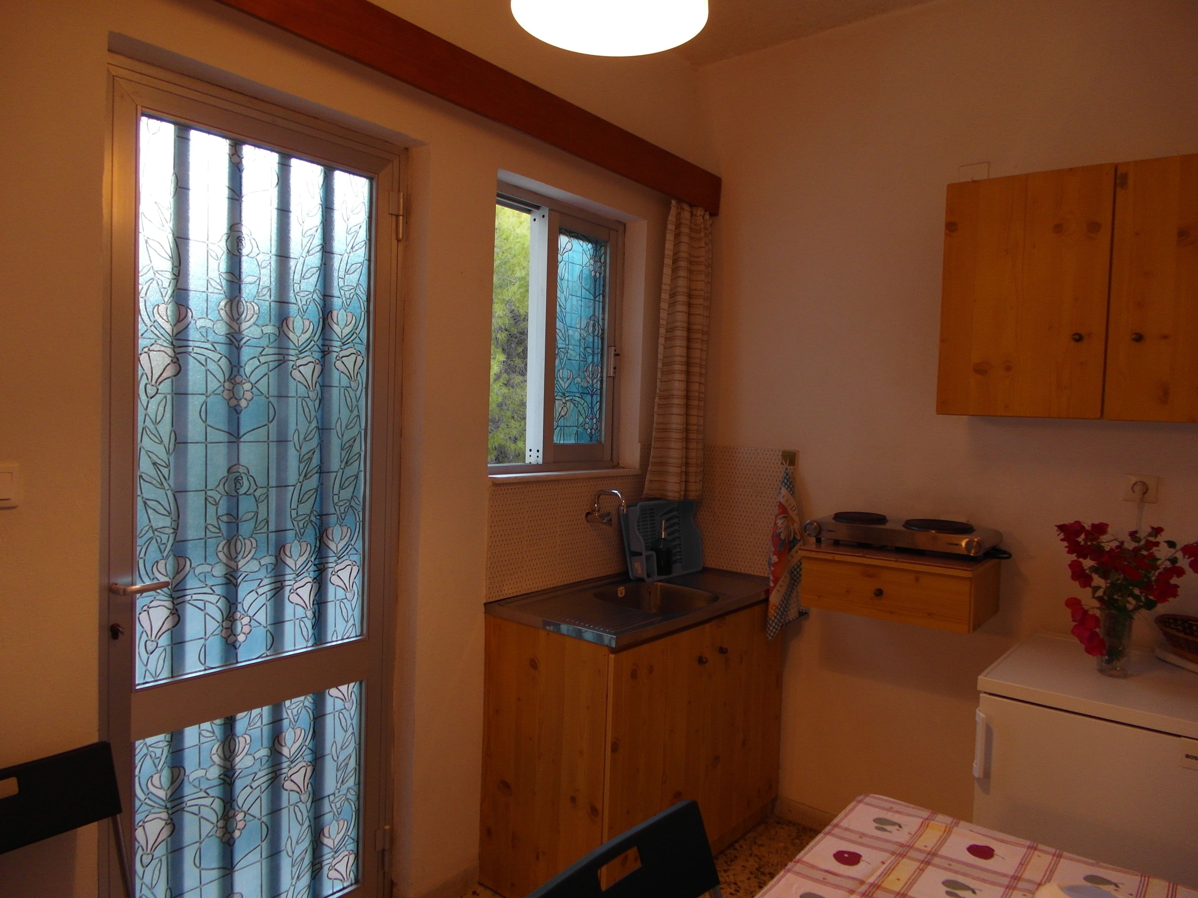 apartment, 1 bedroom, sea view | private kitchen | fridge, oven, stovetop, electric kettle