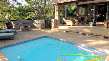 Outdoor pool, pool umbrellas, pool loungers
