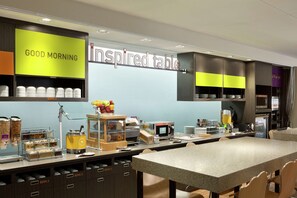 A breakfast area with a sign reading "GOOD MORNING" and "inspired table". - Home2 Suites by Hilton McAllen (McAllen)
