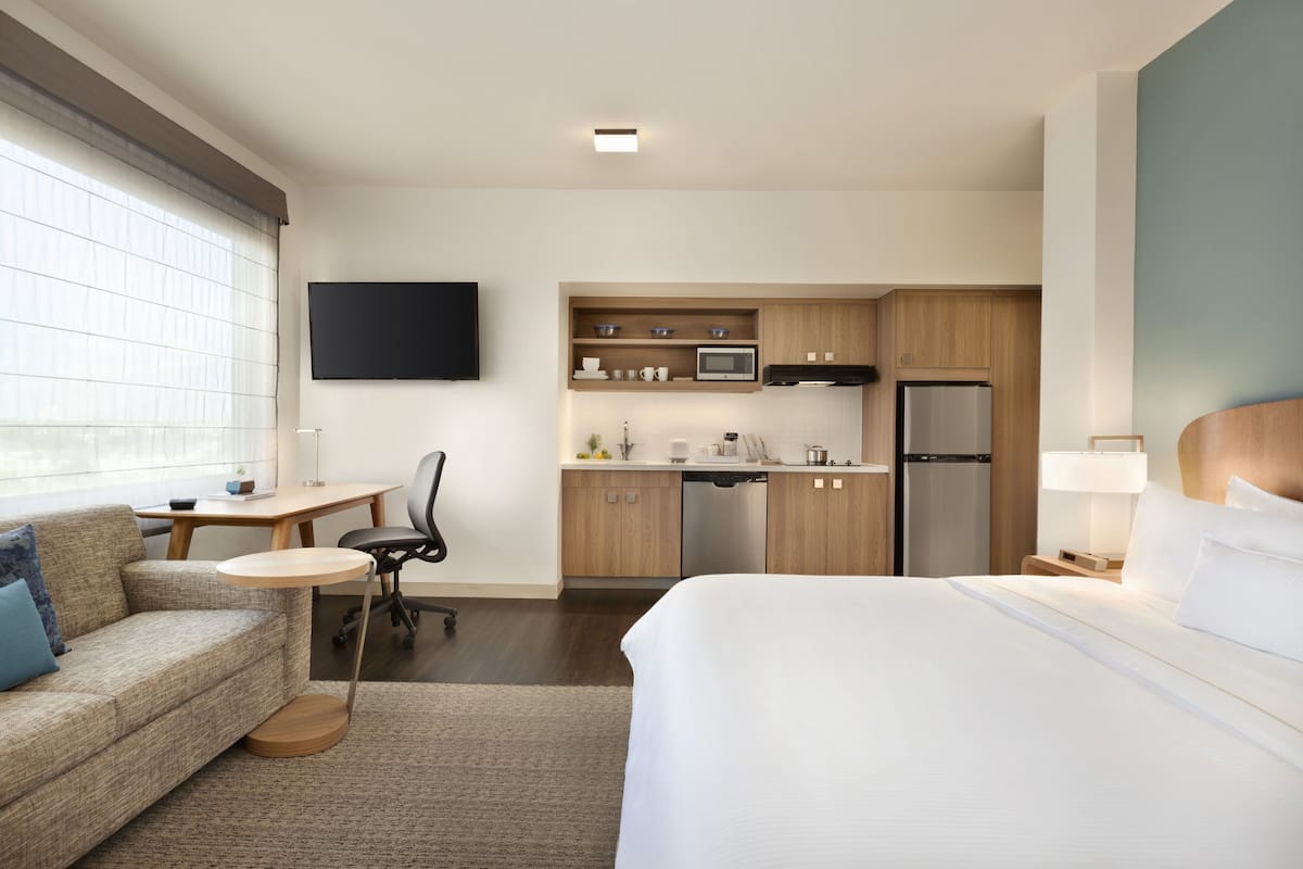 full-sized fridge, microwave, stovetop, dishwasher