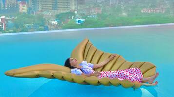 Outdoor pool, open 8:00 AM to 6:00 PM, free pool cabanas, pool loungers