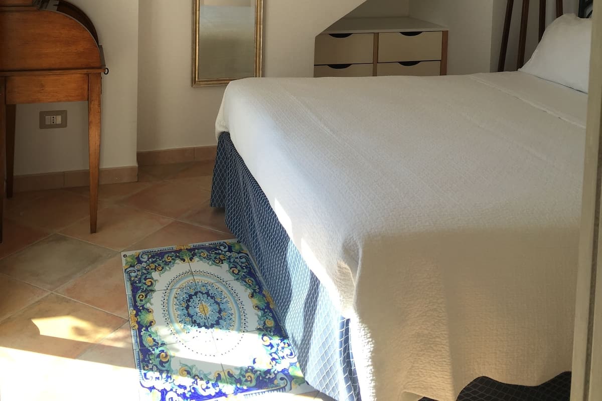2 bedrooms, down comforters, blackout drapes, soundproofing