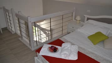 Standard Duplex, Sea View (Camera Mughetto) | 1 bedroom, in-room safe, individually decorated, individually furnished