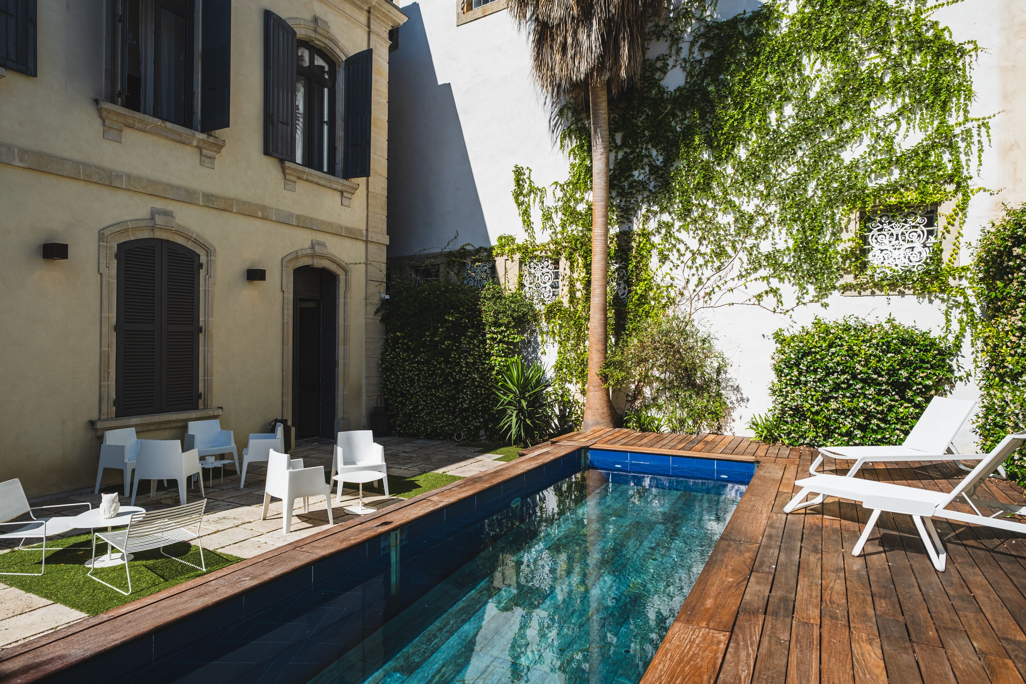 seasonal outdoor pool, pool umbrellas, pool loungers