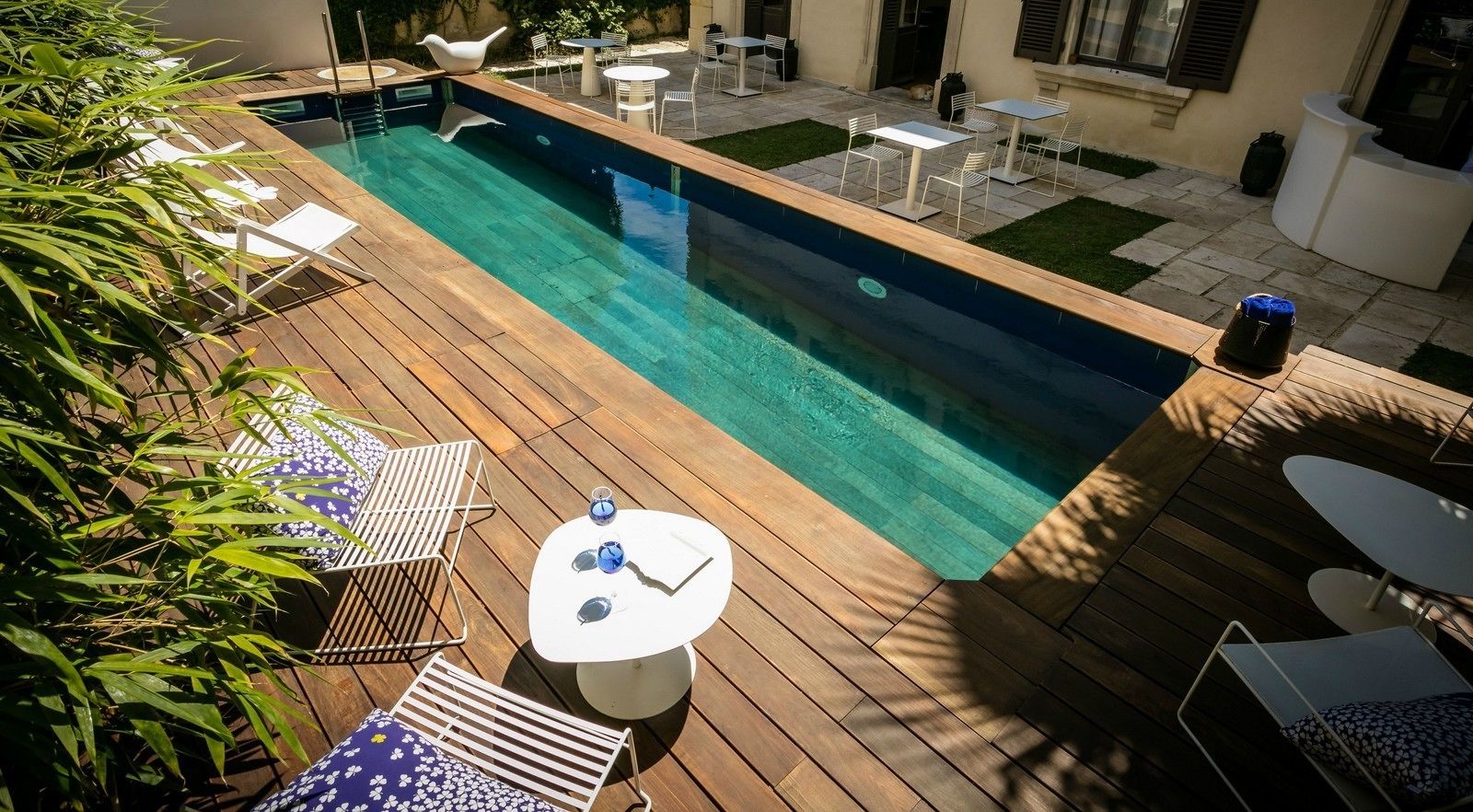 seasonal outdoor pool, pool umbrellas, pool loungers