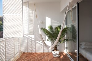 Quarto casal superior, vista para o jardim | Terraço/pátio