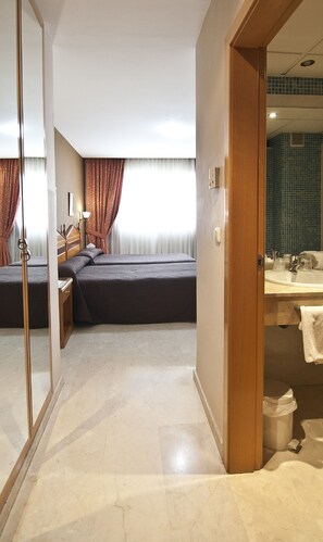 Desk, blackout drapes, free cribs/infant beds, rollaway beds