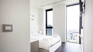 Apartamento superluxo, 3 quartos (Via Della Liberazione 15) | Roupas de cama premium, cofres nos quartos, escrivaninha