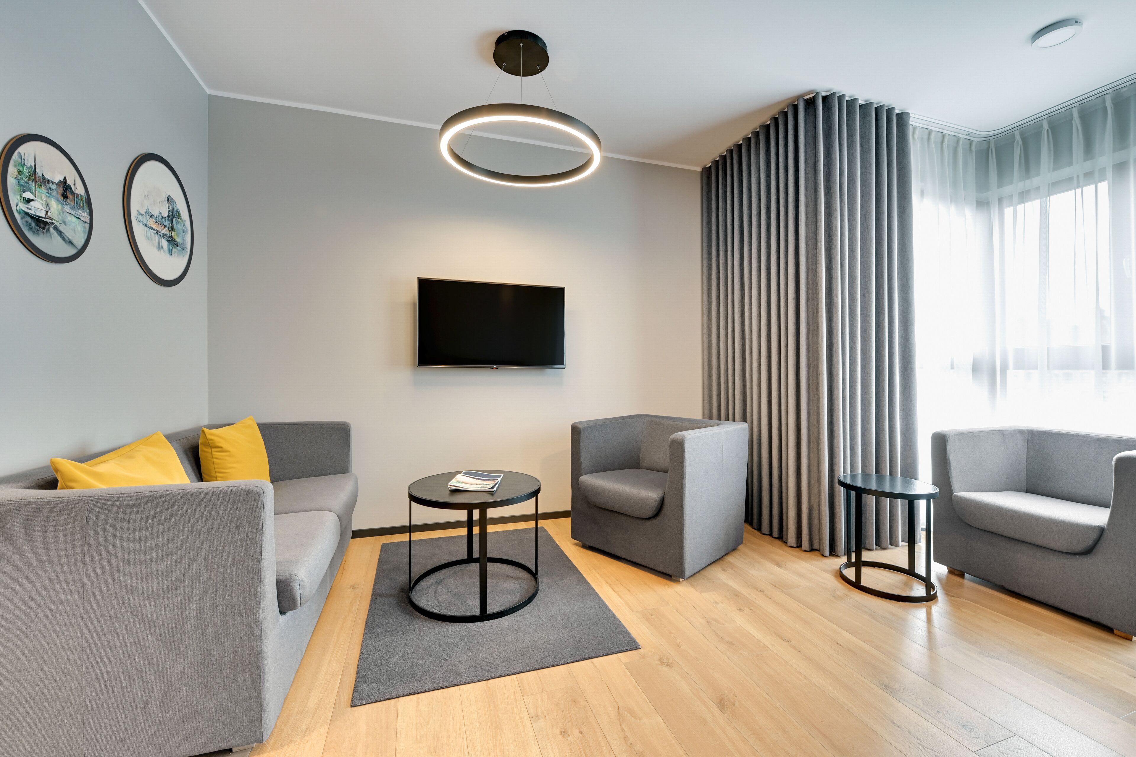 single room | living area | flat-screen tv