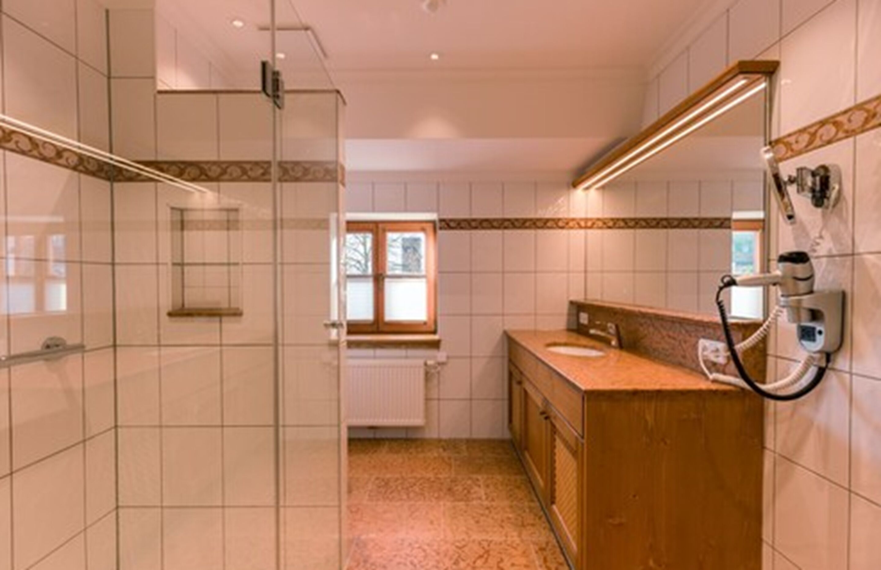 standard double room single use | bathroom | rainfall showerhead, free toiletries, hair dryer, towels