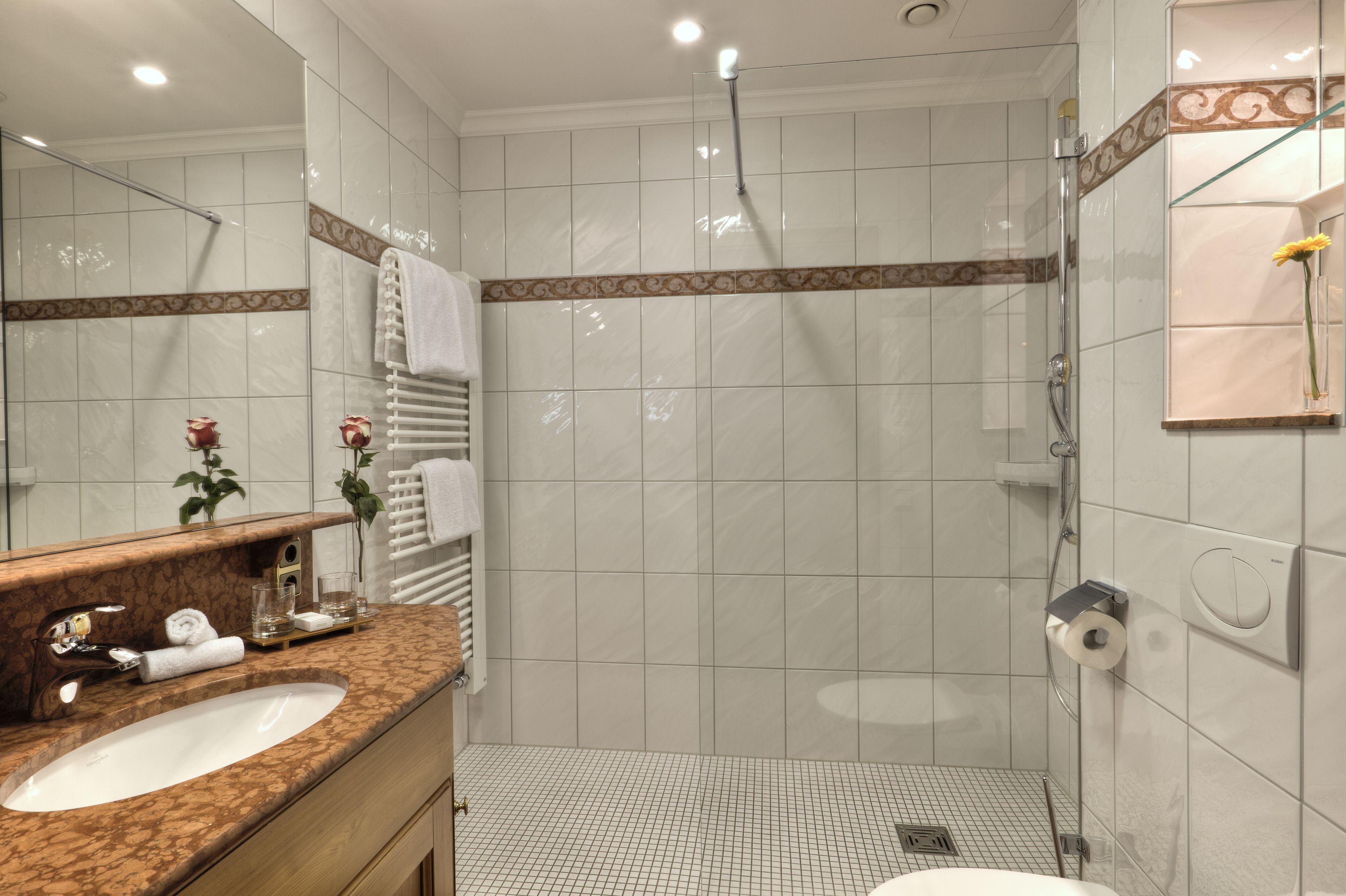 rainfall showerhead, free toiletries, hair dryer, towels