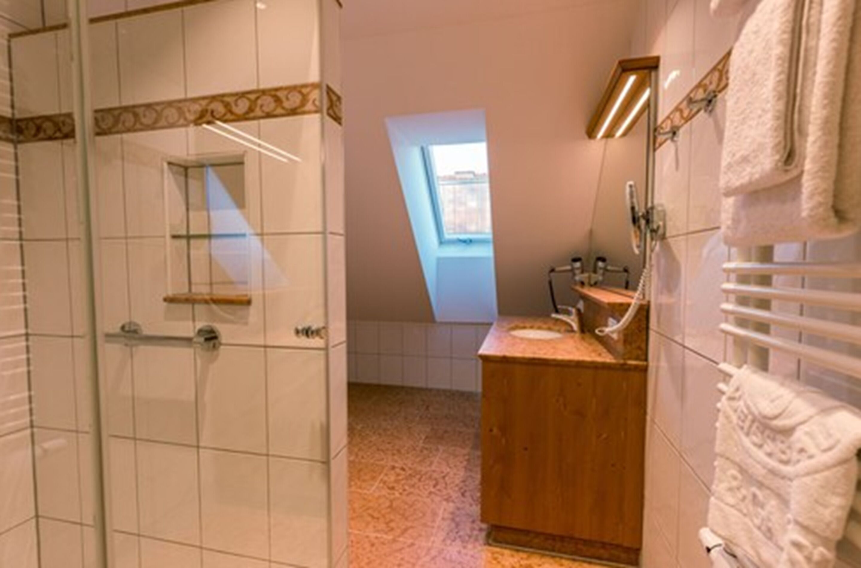 family room, 2 bedrooms | bathroom | rainfall showerhead, free toiletries, hair dryer, towels