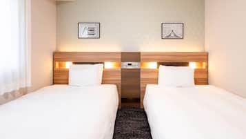 Habitación estándar, 2 camas individuales, para no fumadores | Ropa de cama de alta calidad y caja de seguridad en la habitación