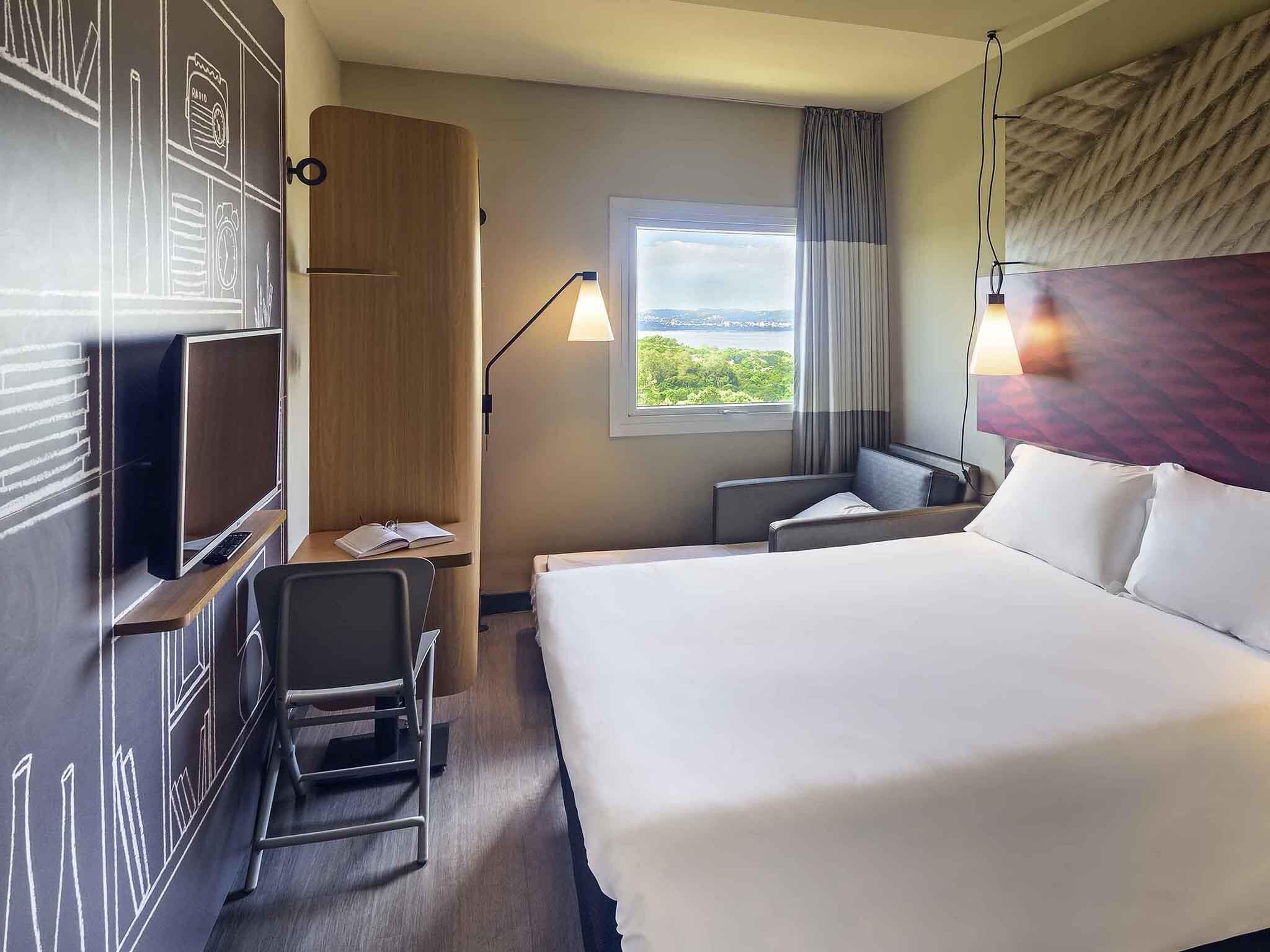 Departamento estándar, varias camas | Minibar, cortinas blackout, insonorización y wifi gratis 