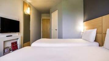 Habitació estàndard, 2 llits individuals | Minibar, cortines opaques, habitacions insonoritzades i wifi gratuïta